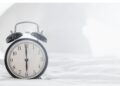 A clock pointing at 6am in the morning.